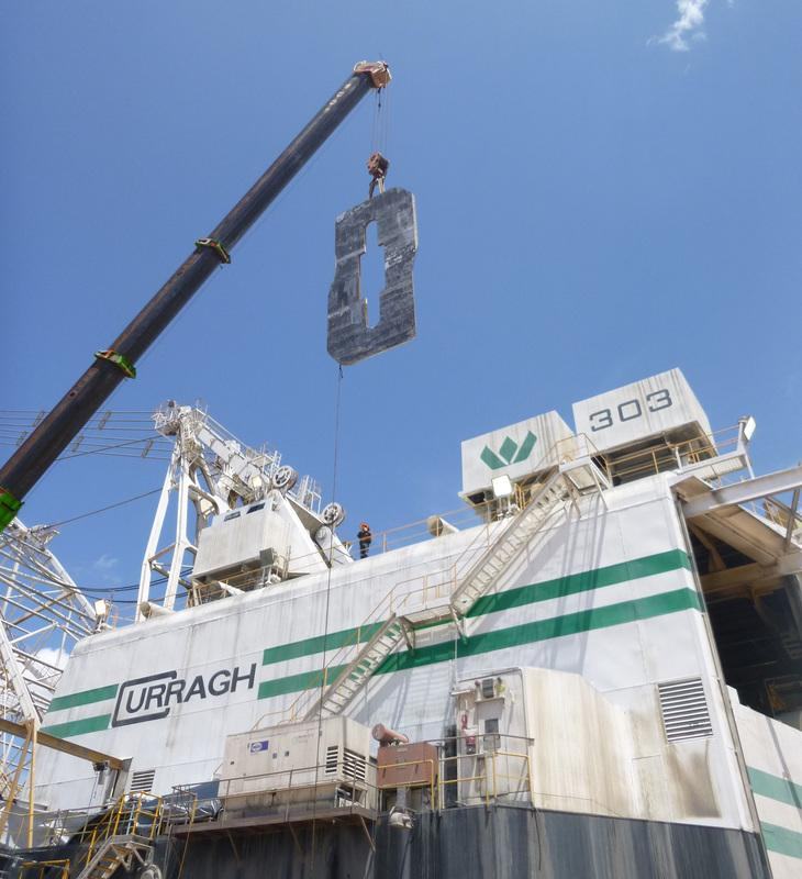 Mobile crane hoisting a large structural component above the Curragh dragline unit 303 on a Bowen Basin mine site