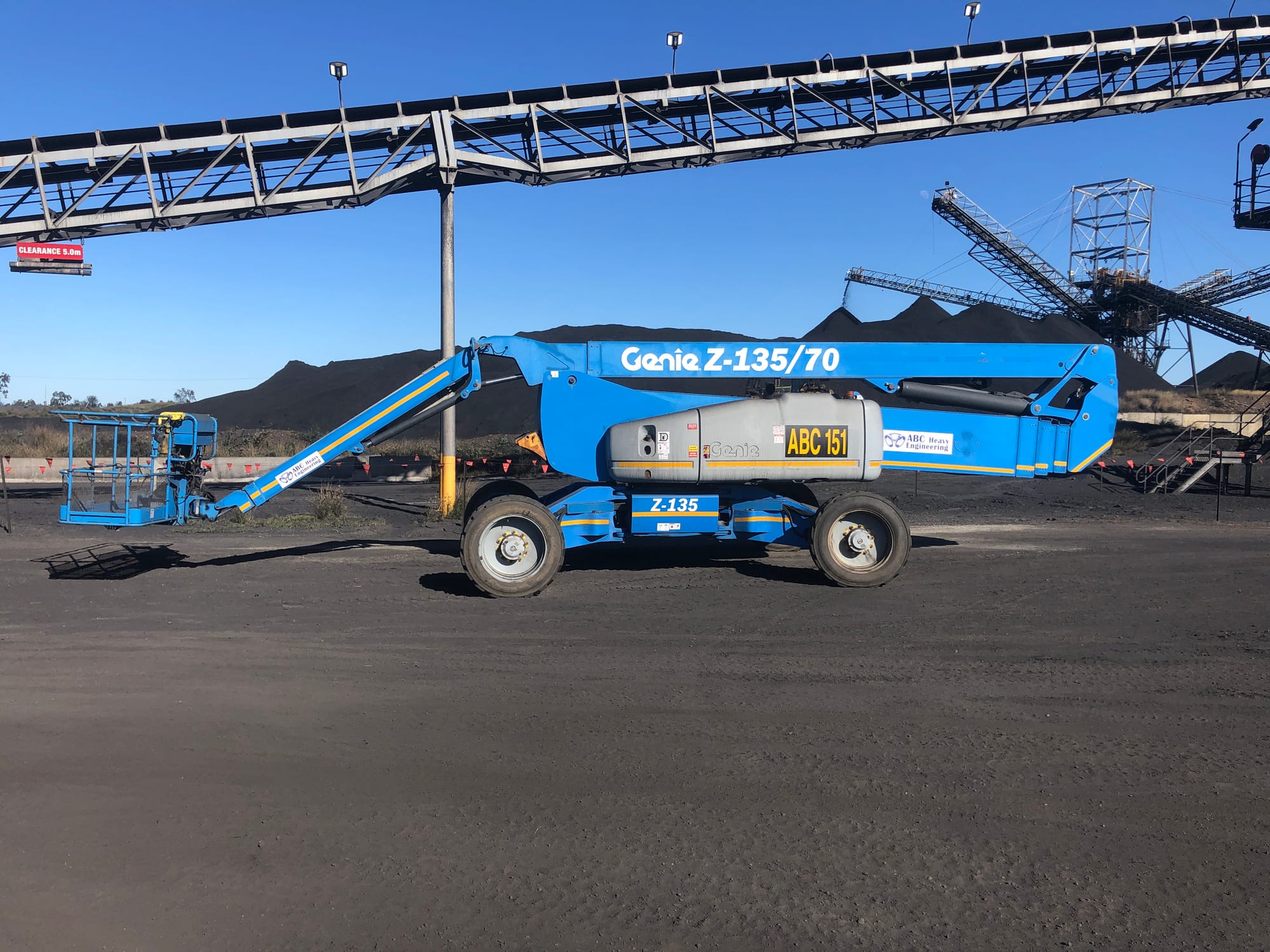Genie Z-135/70 boom lift, fleet number ABC 151, working at a coal handling plant